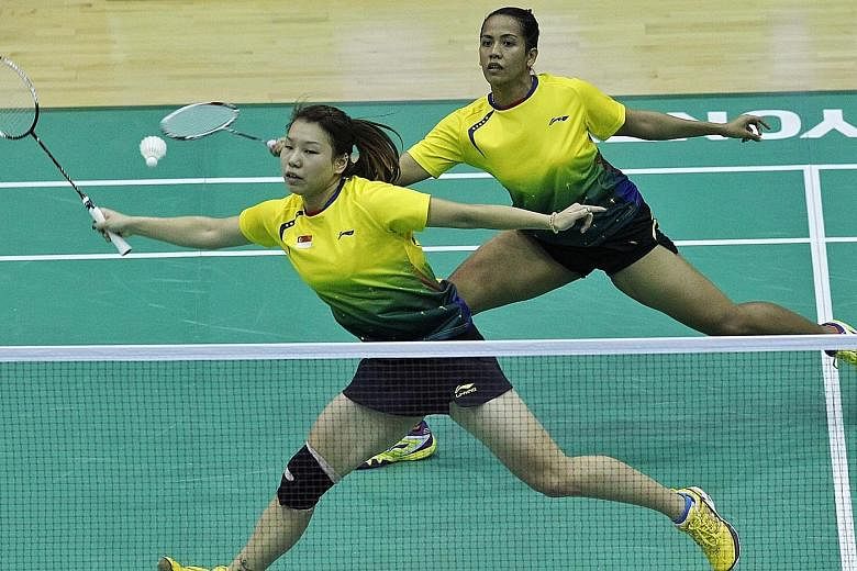 Former national shuttler Yao Lei is best known for her women's doubles partnership with Shinta Mulia Sari. They are pictured here playing at the SEA Games in Myanmar in December 2013. They also paired up for the Commonwealth and the Olympic Games.