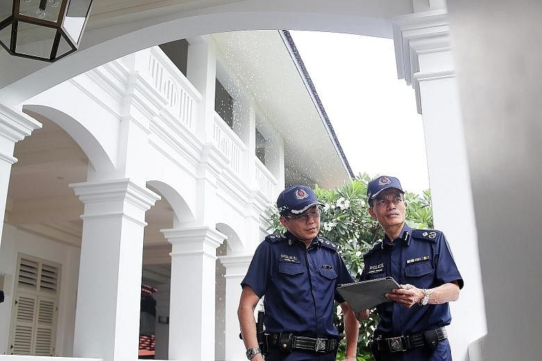Assistant Commissioner Jarrod Pereira (right), commander of Clementi Police Division, and Superintendent Daniel Hui, Clementi police's head of operations, were involved in the operations at the Capella hotel.