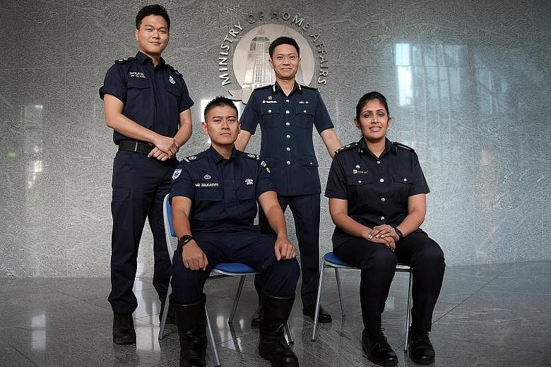 Home Team officers involved in the Trump-Kim summit: (from left) Inspector (NS) Gim Joo Hyung, Police Coast Guard; Warrant Officer 1 Mohammed Zulkasfyi Yunos, 35, emergency medical technician, Singapore Civil Defence Force; Director of Operations Sen