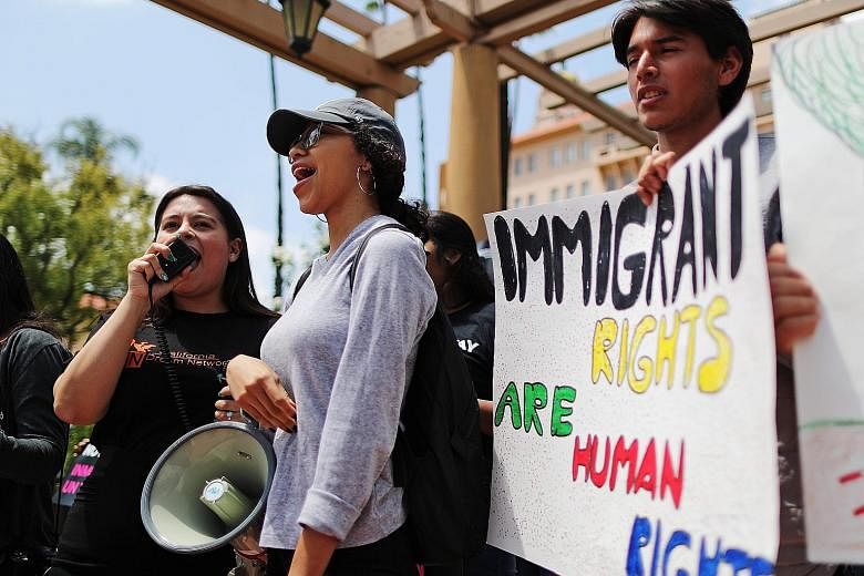 Protesters in California demonstrating against the termination of the Deferred Action for Childhood Arrivals programme in May.