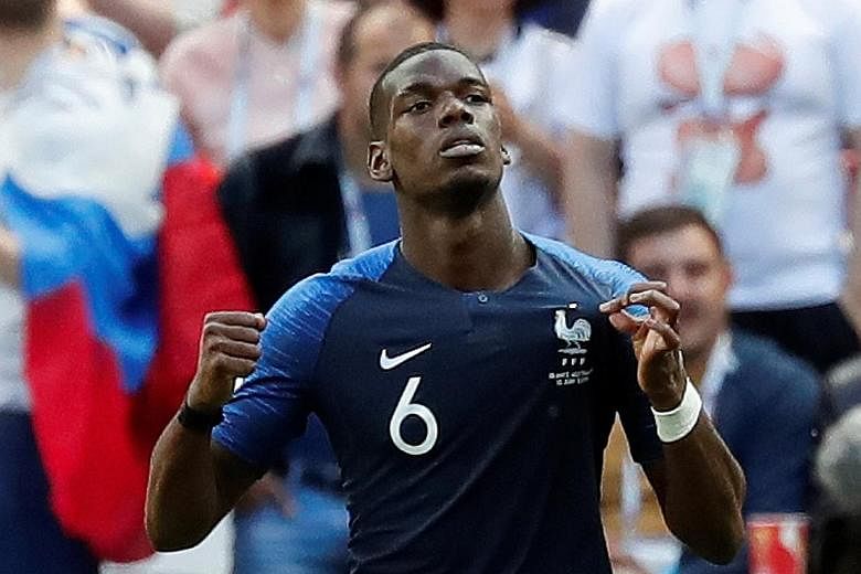 France's Paul Pogba celebrates after scoring his team's second goal, which sealed all three points, against Australia.