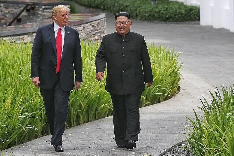 President Donald Trump and North Korean leader Kim Jong Un strolling through the grounds of the Capella Singapore after their working lunch. Mr Kim's image has changed since he came out to the world. The positive vibe was keenly felt during the summi