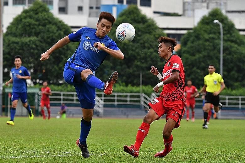 Above: Nurhilmi Jasni scored the game's only goal. Left: Hougang United's Illyas Lee (in blue), keeping Balestier Khalsa's Hazzuwan Halim at bay. Hougang defeated Balestier 1-0 for their first victory of the season at the 11th attempt.