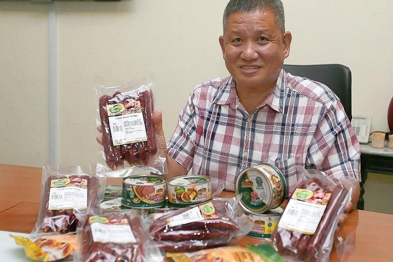 Golden Bridge managing director Ong Bee Chip, with halal products sold under the El-Dina and Kizmiq brands.