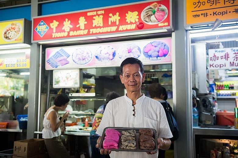 Mr Law Teng Hwa, 59, the owner of Tiong Bahru Teochew Kueh, with his different kueh versions. His most popular offering mixes brown and white rice along with black beans, peanuts and shrimp.