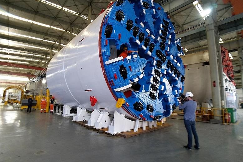 A 6.7m-diameter tunnel boring machine that will be shipped to Singapore, for the North East Line Extension project, being assembled in a factory in Zhengzhou, Henan province.
