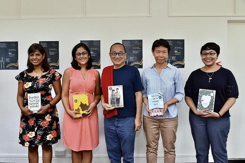Ethos Books' associate publisher Ng Kah Gay (centre) with Singapore Literature Prize nominees (from left) Euginia Tan, Charmaine Chan, Theophilus Kwek and Charmaine Leung. Epigram Books founder Edmund Wee (centre) with authors (from left) Jennani Dur