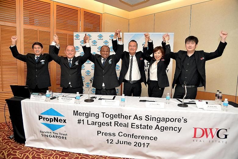 Celebrating the merger of their companies on June 12 last year were (from left) PropNex's director Alan Lim, key executive officer Lim Yong Hock, and CEO Ismail Gafoor, Dennis Wee Realty's founder Dennis Wee, its director Priska Wee, and executive di