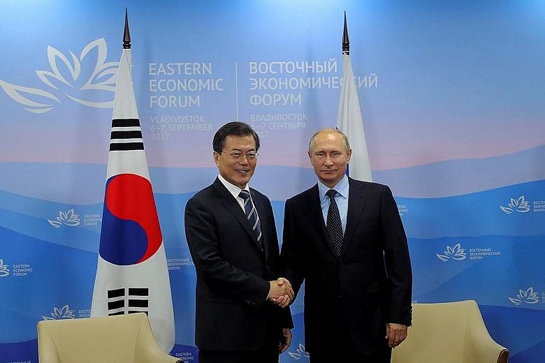 Russian President Vladimir Putin and South Korean President Moon Jae-in at the Eastern Economic Forum meeting in Vladivostok last September.
