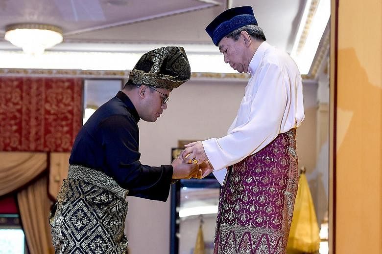 Mr Amirudin Shari (far left) was anointed as chief minister by Selangor's Sultan Sharafuddin Idris Shah (left) on Tuesday, a move disputed by Dr Idris Ahmad (above).