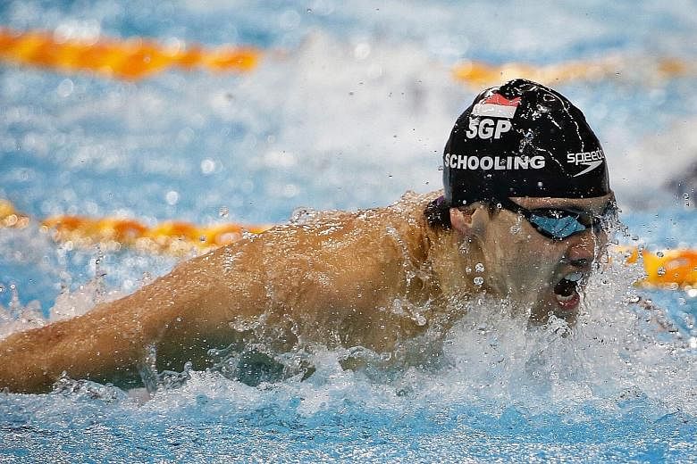 Joseph Schooling en route to victory in the 100m butterfly at the 14th Neo Garden Singapore National Swimming Championships yesterday. He won the race in 52.43sec.