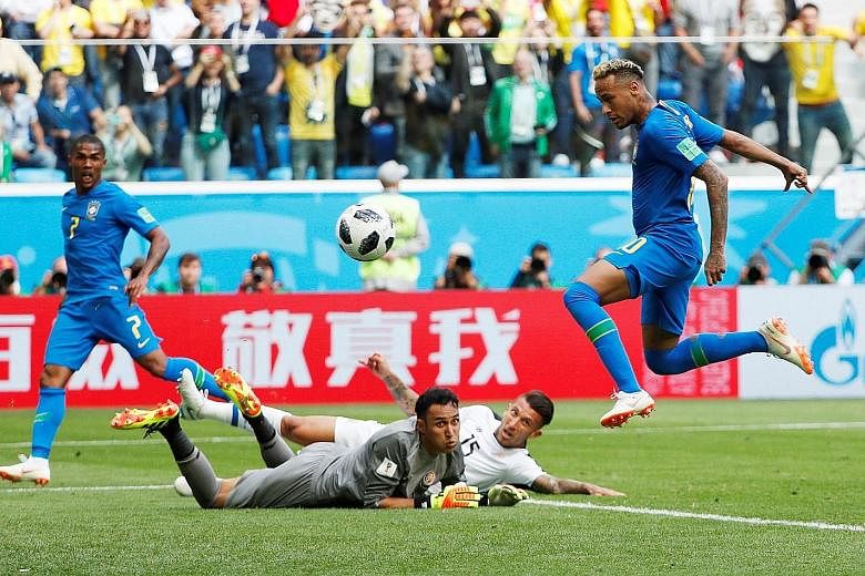 Neymar tapping home a cross from Douglas Costa (unseen) for Brazil's second goal as the Costa Rican rearguard of Keylor Navas and Francisco Calvo can only look on despairingly in stoppage time.