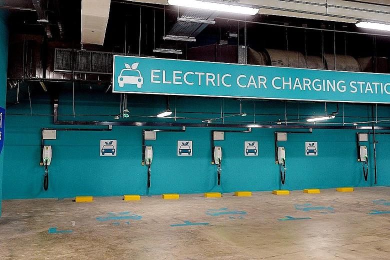 The electric car charging stations at Our Tampines Hub. Land Transport Authority figures show the number of fully-electric and plug-in hybrid cars growing from 137 two years ago to 592 as of April.
