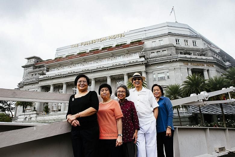 (From left) Ms Sandra Liew, Ms Judy Tam, Madam Tan Lat Neo and her husband Robert Lim, and Ms Cynthia Low , all of whom worked at the former General Post Office in the Fullerton Building, which is now The Fullerton Hotel Singapore. The hotel is colle