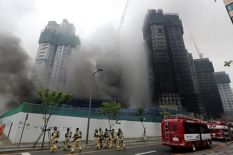 The fire started in the underground parking garage of the building under construction in Sejong city. Firefighters had a hard time fighting the flames as there was no fire extinguishing system in the structure.