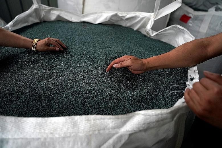 Plastic scrap at a Taicang Jinhui Recycling factory, in Taicang, Jiangsu province, China, is turned into pellets used to make manufactured goods.