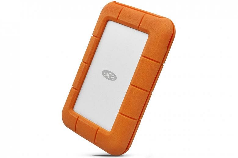 The new Rugged Secure external hard drive is buffered from drops and other external shocks by a bright-orange rubber bumper around its silver aluminium case.