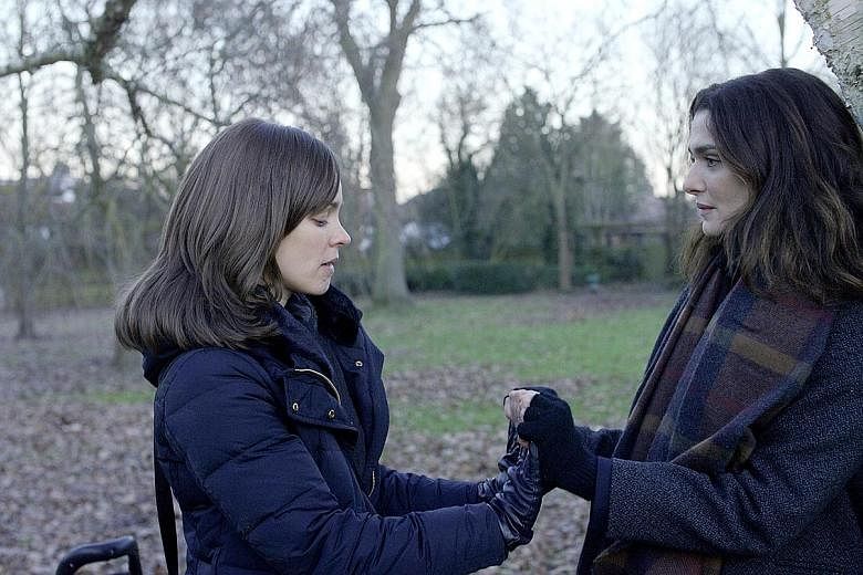 Rachel McAdams (left) and Rachel Weisz are in a triangular love story in Disobedience.