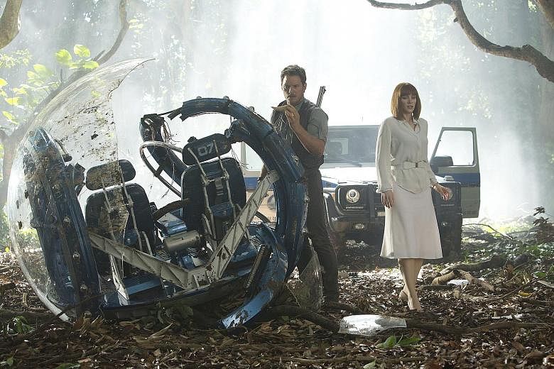 Bryce Dallas Howard (above, with Chris Pratt) runs in high-heeled shoes from dinosaurs in Jurassic World.