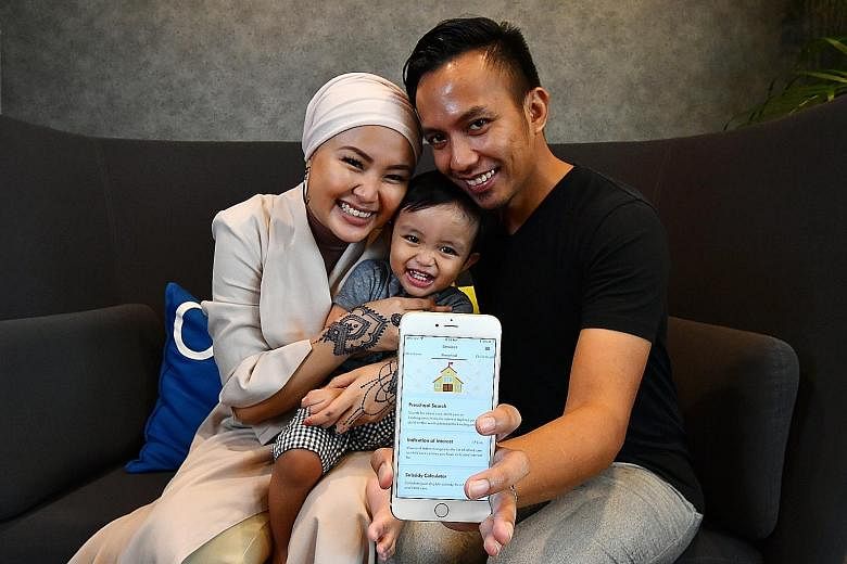 Freelance content creator Ateeqah Mazlan, 29, with her husband, music producer Rostam Effendie Yacob, 36, and their 18-month-old son Ezra. The couple find the pre-school search function in the Moments of Life (Families) app the most helpful feature.