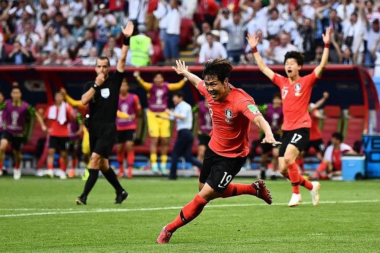 Kim Young-gwon wheeling away after putting South Korea ahead in added time against Germany on Wednesday in Kazan. Son Heung-min's goal wrapped up the Taeguk Warriors' memorable 2-0 win, sending the world champions and top-ranked team to their earlies