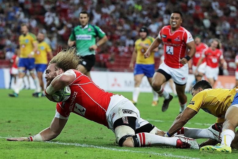 Sunwolves captain and flanker Willie Britz scoring a try during their third win of the year last night at the National Stadium - the most in any Super Rugby season.