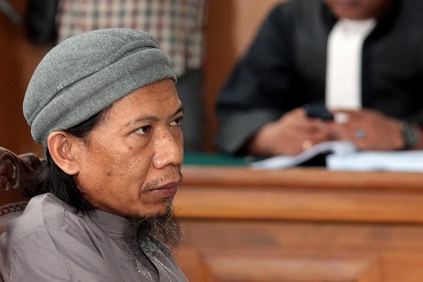 Aman Abdurrahman has decided not to appeal against the death sentence, meaning he could face the firing squad soon. Top: The radical cleric's home in Licin village in Sumedang, a two-hour drive from Bandung. His wife and children still live there.