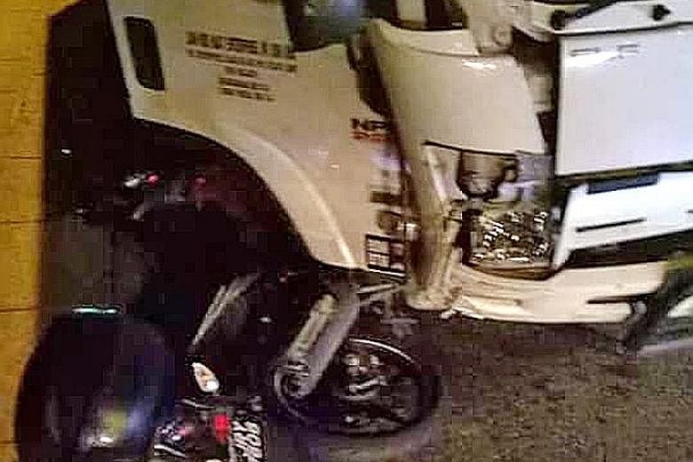 Photos of yesterday morning's accident posted on social media showed motorcycles strewn along the road and one underneath a lorry (top right).