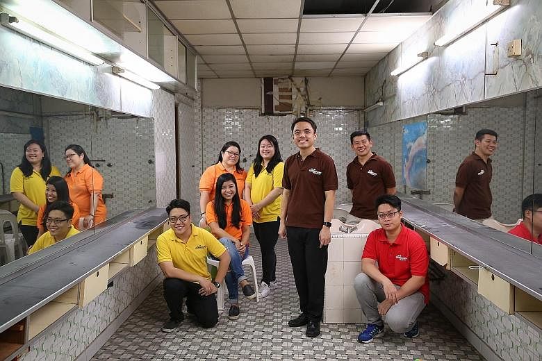 Helping to transform this shophouse unit into a community museum are the team members behind heritage group My Community (from left): Mr Victor Li, 35, Ms Yvonne Lin (seated), 35, Ms Chen Kim Yen, 47, Ms Grace Tng, 35, Mr Kwek Li Yong, 29, Mr Choo Li