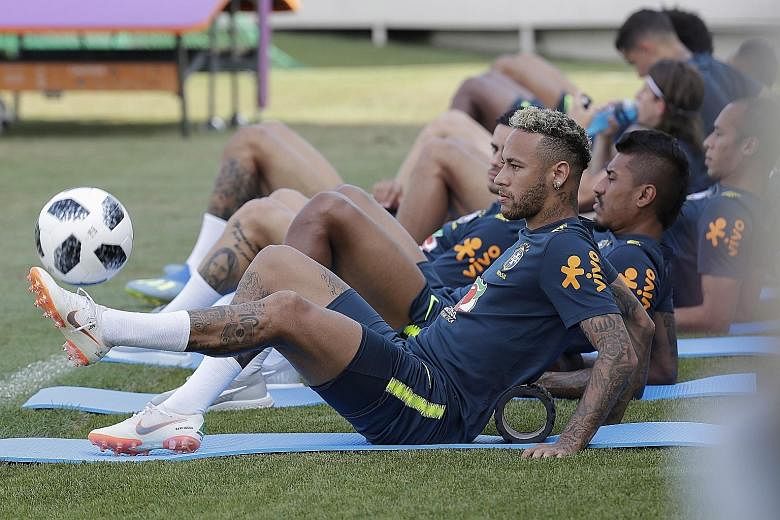 Brazil forward Neymar and his team-mates training ahead of today's last-16 match against Mexico. The central American side are, however, no pushovers despite being underdogs, having won six of their 14 match-ups with the five-time world champions sin