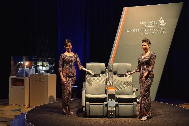SIA unveiling its premium economy class products in 2015. Recent studies have shown that it is economy travellers, especially those on work trips, who have moved up, putting to rest fears that the new offering would cannibalise the premium market.