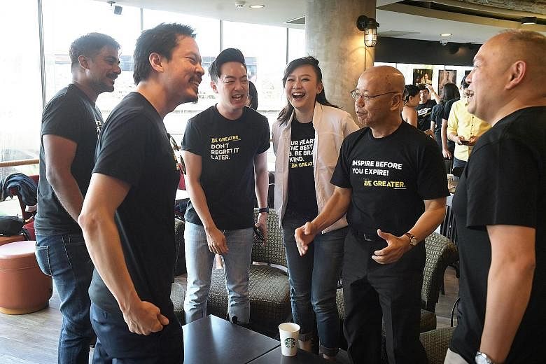 Collaborators at the launch of the Singapore Kindness Movement's Be Greater campaign yesterday included (from left) singers Jack and Rai, emcee Royce Lee, magician Ning Cai, SKM general secretary William Wan, and Starbucks Singapore general manager P