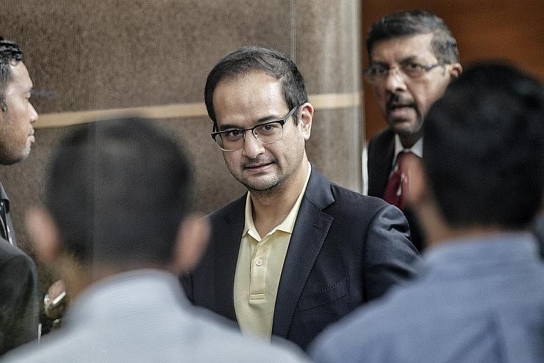 Film producer Riza Aziz, stepson of former Malaysian prime minister Najib Razak, arriving at the Malaysia Anti-Corruption Commission in Putrajaya yesterday to give his statement. Sources said Mr Riza is expected to, among other things, address allega