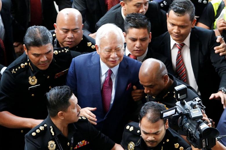 Najib pleads not guilty to corruption charges linked to 1MDB, vows to ...