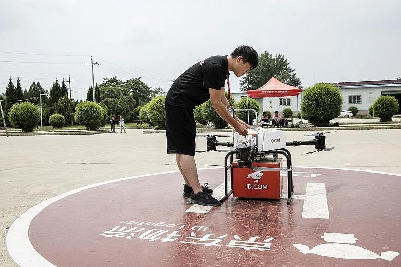 A JD.com drone at the company's testing site in Xi'an, China. JD.com is racing companies from across the world to develop unmanned aerial vehicles with the strength, range and reliability to deliver goods on a large scale and solve the expensive "las