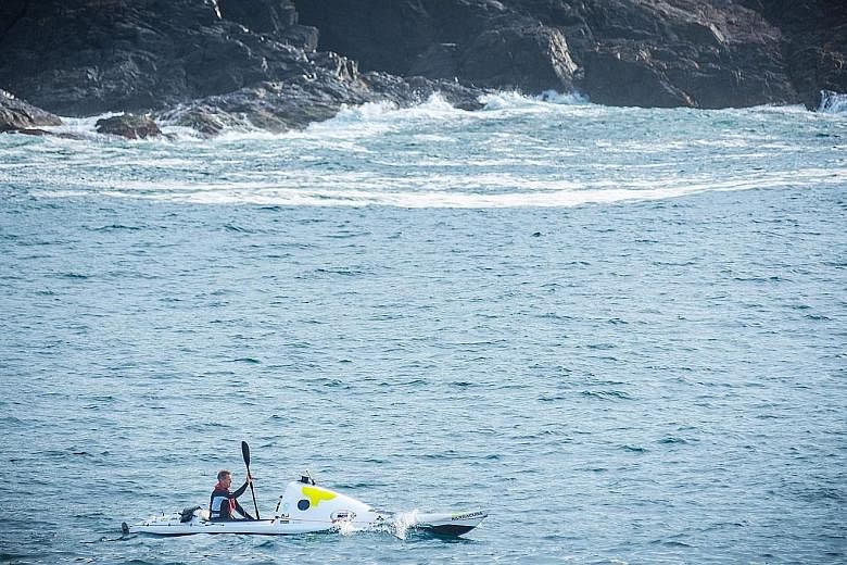 Above and left: Adventurer Scott Donaldson had set off from Australia's Coffs Harbour on May 2 on a 2,200km journey in a 6m-long kayak. He arrived at New Plymouth, on New Zealand's North Island, late on Monday night.