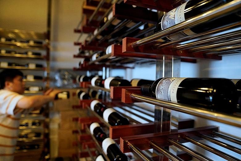 Bottles of red wine imported from the US in Shanghai. American goods from wine to potato chips are disappearing from some stores in China as importers turn to substitutes from other places. The tariffs have hurt profit margins for American products i
