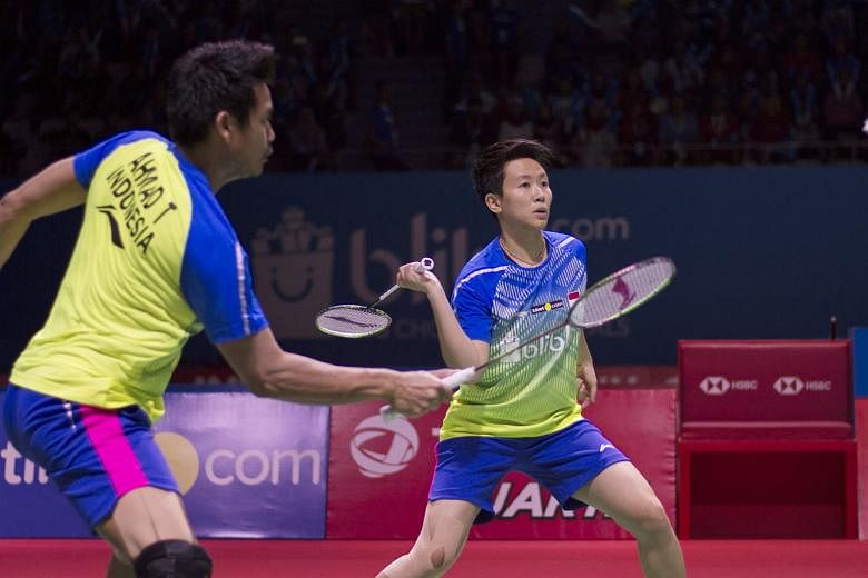 Liliyana Natsir and Tontowi Ahmad in the mixed doubles quarter-final match at the Indonesia Open yesterday, when they beat China's Zhang Nan and Li Yinhui. The Indonesian pair have withdrawn from the World Championships in China to focus on next mont