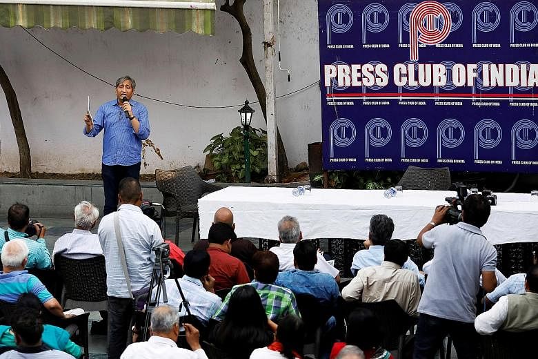 TV anchor Ravish Kumar speaking to a group of journalists at the Press Club of India in New Delhi in April. He has redefined Indian journalism by using his Hindi language programme to speak out for ordinary Indians who feel that every single institut