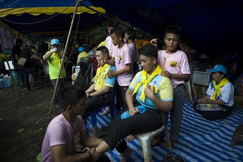 Volunteers also deliver and serve free food to all those involved in the massive rescue operation. Many Thais have been moved by the story of the trapped boys and their coach.