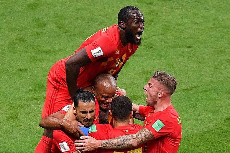 Belgium's Romelu Lukaku jumping over team-mates to celebrate Brazil's own goal during the quarter-final in Kazan on Friday. Kevin de Bruyne made it 2-0 in the 31st minute before substitute Renato Augusto pulled one back for the Brazilians with 14 min