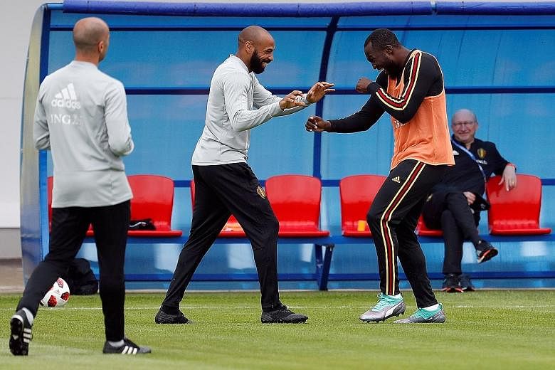Belgium assistant coach Thierry Henry (left), a Frenchman, having a friendly sparring session with Belgian striker Romelu Lukaku in training, before their respective countries spar for real in the World Cup.