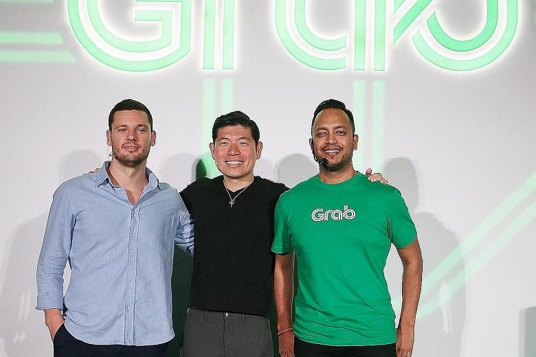 (From far left) HappyFresh CEO Guillem Segarra, Grab CEO Anthony Tan and Grab product head Jerald Singh. The two firms are partners in GrabFresh.