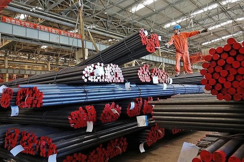 Steel bars at a warehouse in Dalian, Liaoning province. The jump in prices of resources such as steel has benefited producers but raised input costs for manufacturers like exporters.