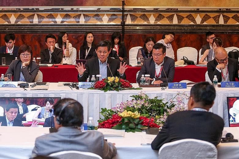 From left: Singapore Press Holdings' Chinese Media Group head Lee Huay Leng, Trade and Industry Minister Chan Chun Sing, and Lianhe Zaobao and Lianhe Wanbao editor Goh Sin Teck at the Singapore-China Forum.