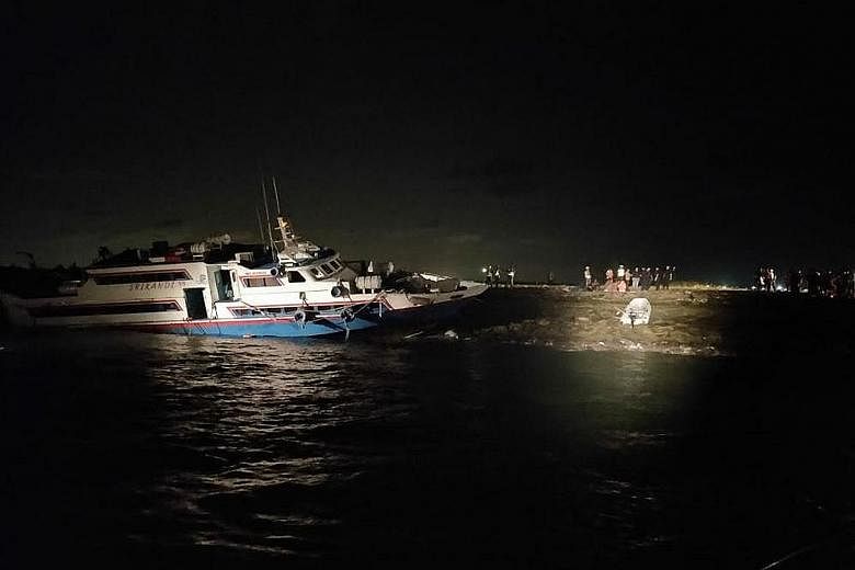 The Indonesian-flagged ferry Sri Kandi 99 ran aground on rocks at the southern tip of Pulau Tekong on Monday night. Singapore Police Coast Guard officers used night-vision technology and searchlights and found five people stuck in the ferry, which wa