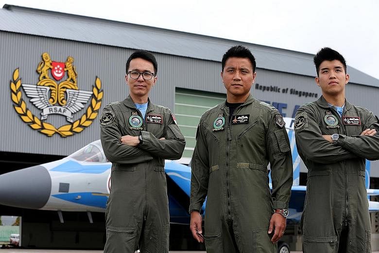 From left: Major Lloyd Lin, an F-16 pilot, with Major (NS) Freddie Lim-Ng and Captain Paul Matthew Lim, who are F-15 pilots. The trio will be participating in the Republic of Singapore Air Force flypast on National Day this year.