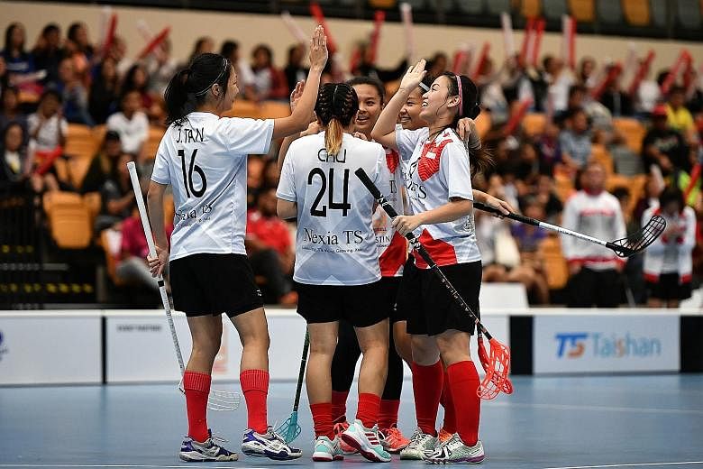 The Singapore women's floorball team after defeating Indonesia 18-0 during the first Asia-Oceania Floorball Cup in June.