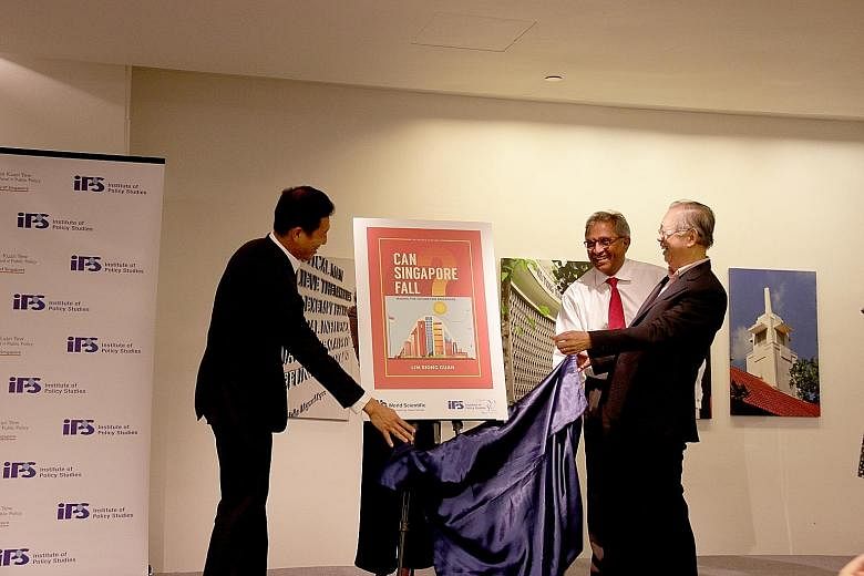 (From left) Education Minister Ong Ye Kung, Institute of Policy Studies director Janadas Devan and Mr Lim Siong Guan at the launch of Mr Lim's book yesterday.