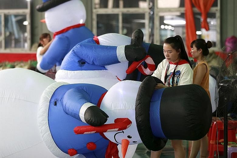 Workers in a Chinese factory for inflated toys, which is mainly for overseas markets. The Trump administration threatened 10 per cent tariffs on another US$200 billion of Chinese goods on Tuesday.
